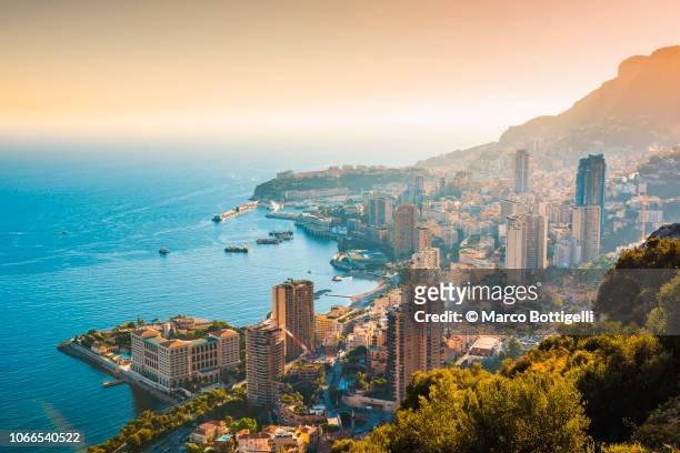 cityscape of monaco and the harbour - costa azul fotografías e imágenes de stock
