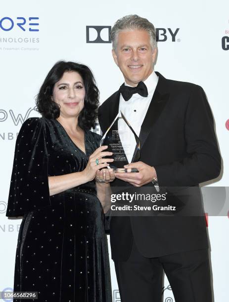 Sue Kroll and Sid Grauman Award Recipient Doug Darrow attend the 32nd American Cinematheque Award Presentation honoring Bradley Cooper at The Beverly...