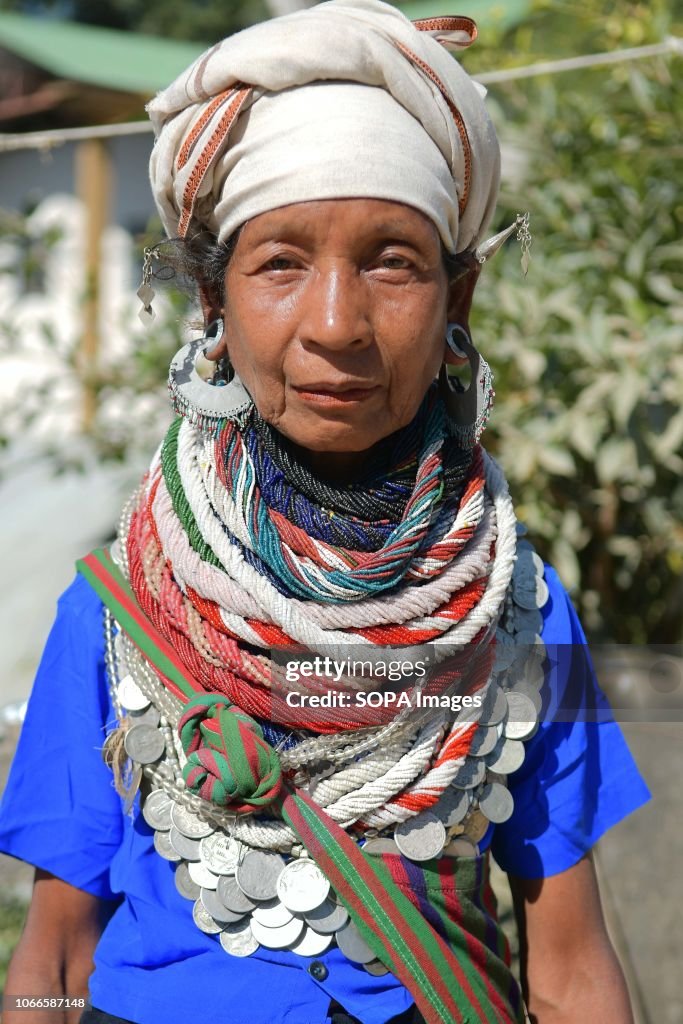 A Bru refugee seen before casting her vote during the...