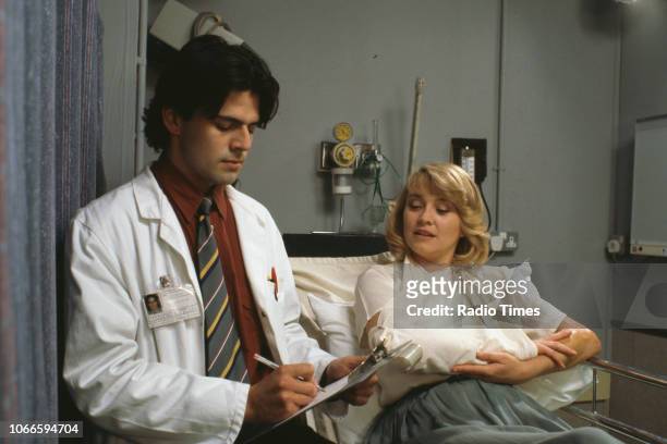 Actors Jason Riddington and Amanda Redman in a scene from episode 'The Ties That Bind' of the BBC television series 'Casualty', September 16th 1992.