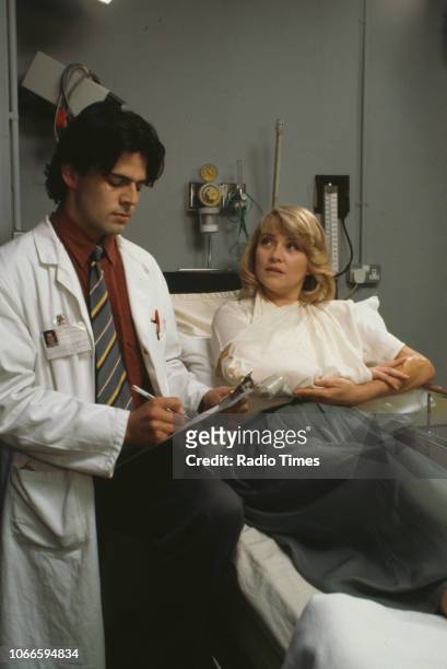 Actors Jason Riddington and Amanda Redman in a scene from episode 'The Ties That Bind' of the BBC television series 'Casualty', September 16th 1992.