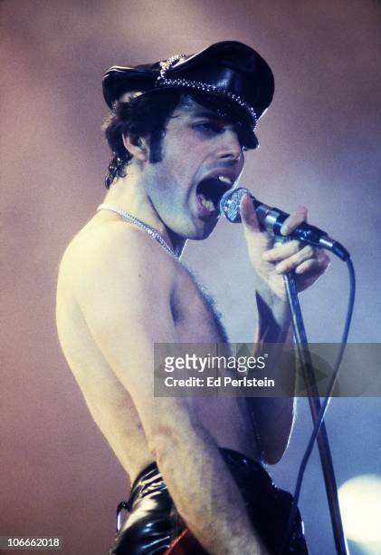 Freddie Mercury performs with Queen at the Oakland Coliseum in December 1978 in Oakland, California.