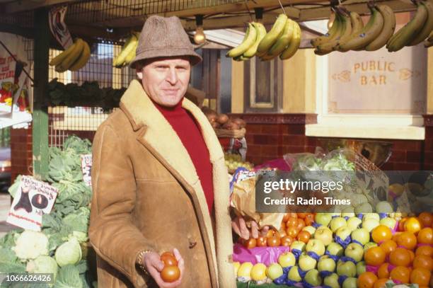 Actor Peter Dean pictured on the exterior set of the BBC soap opera 'EastEnders', 1984.