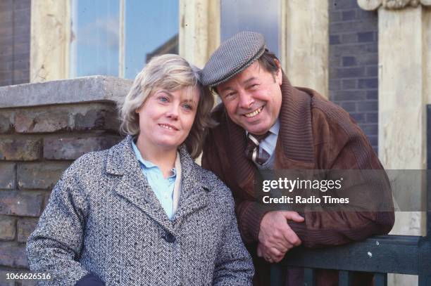 Actors Wendy Richard and Bill Treacher pictured on the exterior set of the BBC soap opera 'EastEnders', 1984.