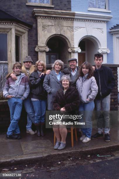 Actors Adam Woodyatt, Peter Dean, Gillian Taylforth, Wendy Richard, Anna Wing, Bill Treacher, Susan Tully and David Scarboro pictured on the exterior...