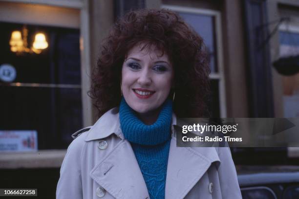 Actress Anita Dobson pictured on the exterior set of the BBC soap opera 'EastEnders', 1986.