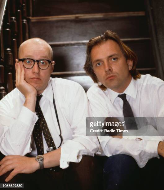 Comic actors Adrian Edmondson and Rik Mayall pictured on the set of episode 'Gas' for the BBC television sitcom 'Bottom', July 4th 1991.