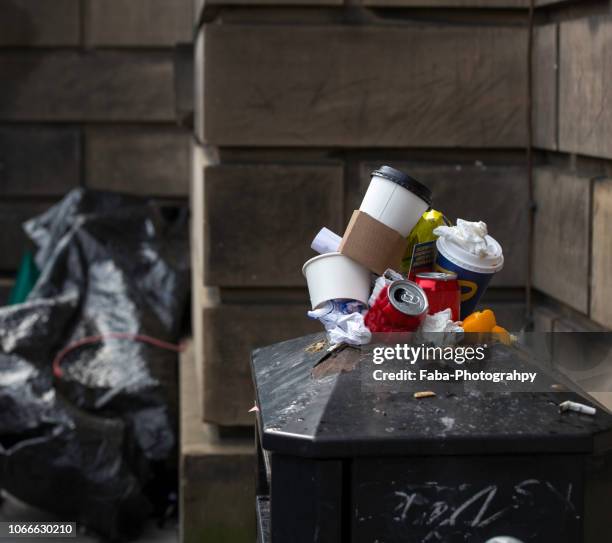 waste overstuffed bin with general waste - overflow stock pictures, royalty-free photos & images