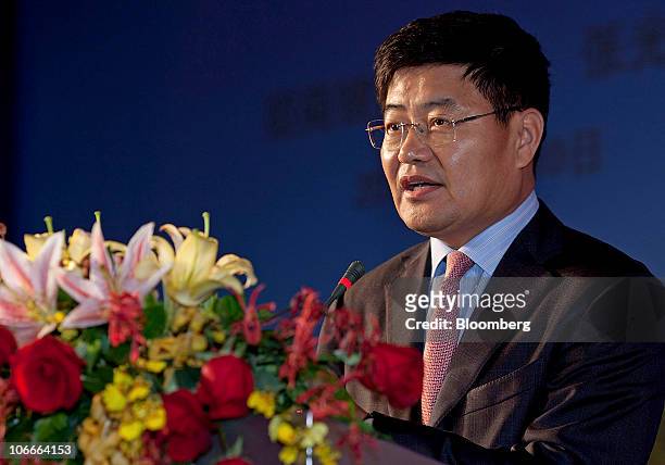 Zhang Guanghua, executive vice president of China Merchants Bank Co Ltd., speaks at the World Shipping Summit in Guangzhou, Guangdong province,...