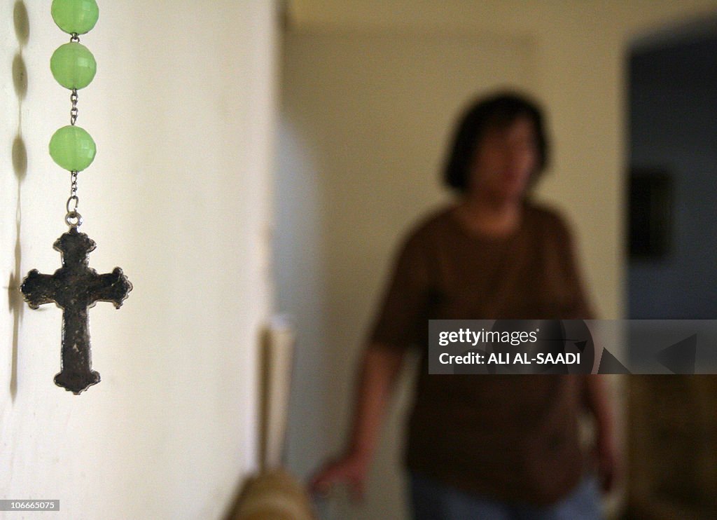 An Iraqi Assyrian Catholic woman is seen