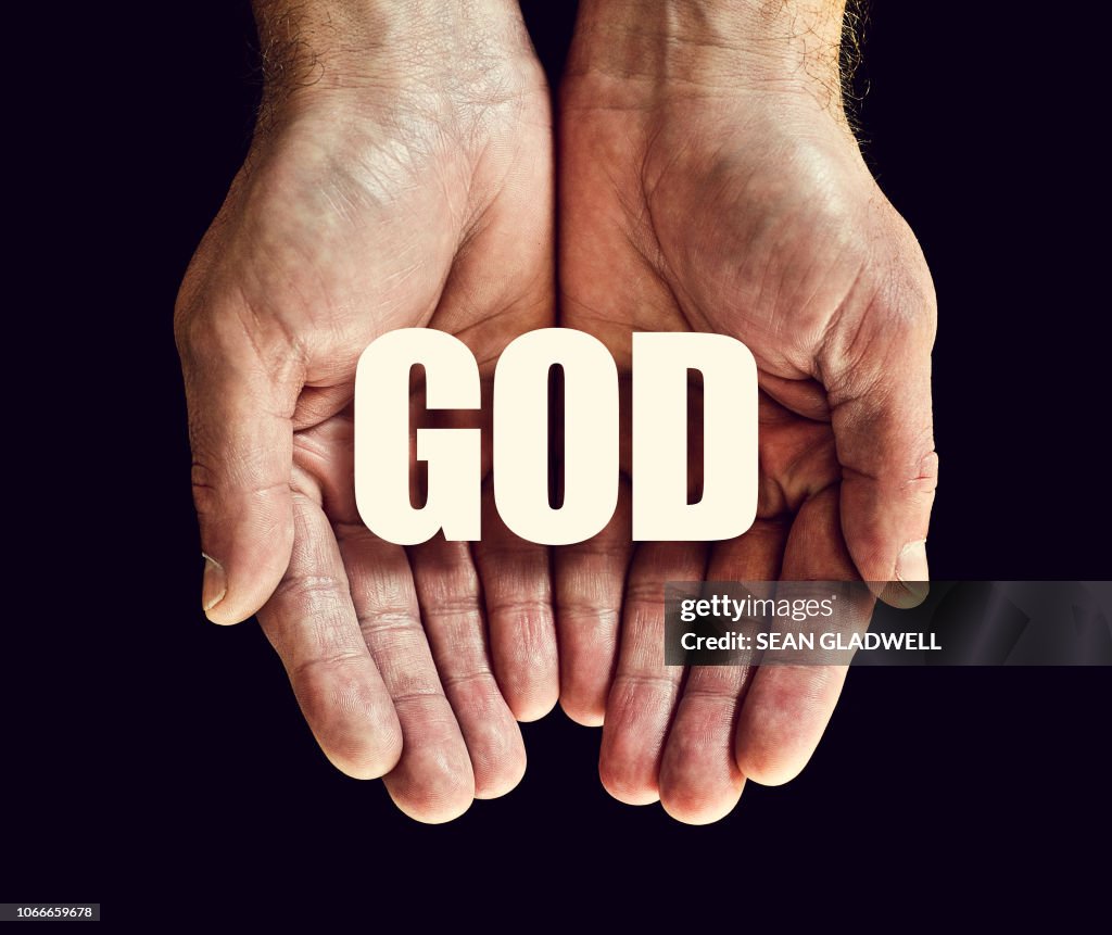 The word god in hands