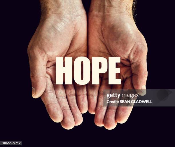 the word hope in hands - hope word stock pictures, royalty-free photos & images