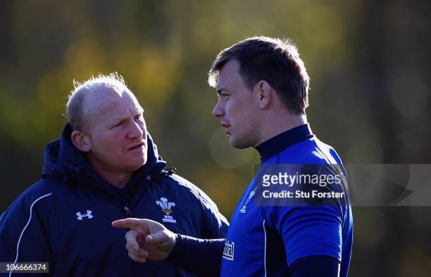 Wales forward Matthew Rees chats with coach Neil Jenkins during Wales Rugby training at Vale of Glamorgan on November 10, 2010 in Cardiff, Wales.