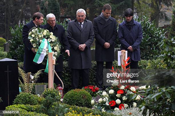 Theo Zwanziger, president of the German Football Association , lays down a wreath next to Karl Rothmund, vice president of the German Football...