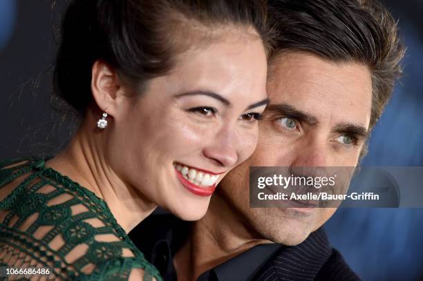 Caitlin Mchugh and John Stamos attend the premiere of Disney's 'Mary Poppins Returns' at El Capitan Theatre on November 29, 2018 in Los Angeles,...