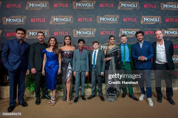 In this handout image provided by NETFLIX, Abhishek Bachchan, Christian Bale, Madhuri Dixit, Kareena Kapoor, Rohan Chand, Louis Ashbourne Serkis,...