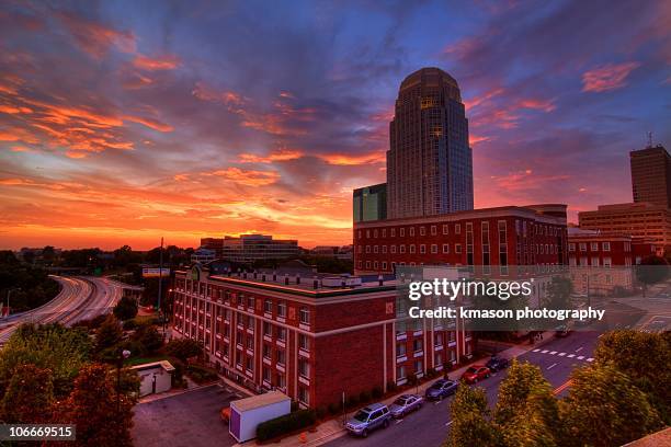 downtown winston salem at sunset - north carolina photos et images de collection