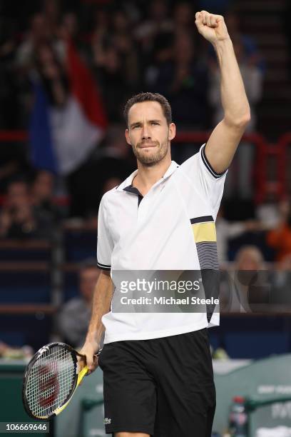 Michael Llodra of France celebrates his straight sets victory against John Isner of USA during Day Four of the ATP Masters Series Paris at the Palais...
