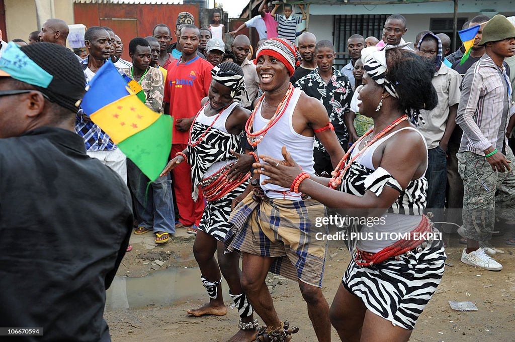 A cultural troupe dances during activiti