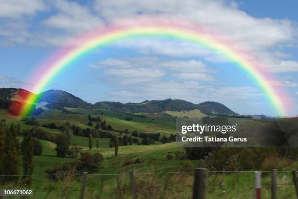 rainbow above the valley, new zealand - landscap with rainbow fotografías e imágenes de stock