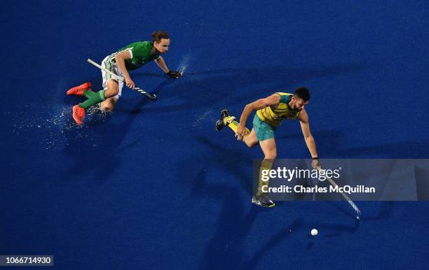 Trent Mitton of Australia and Sean Murray of Ireland during the FIH Men's Hockey World Cup Pool B match between Australia and Ireland at Kalinga...