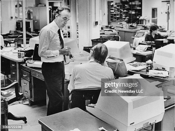 Rupert Murdoch stands in the newsroom of the New York Post in... News