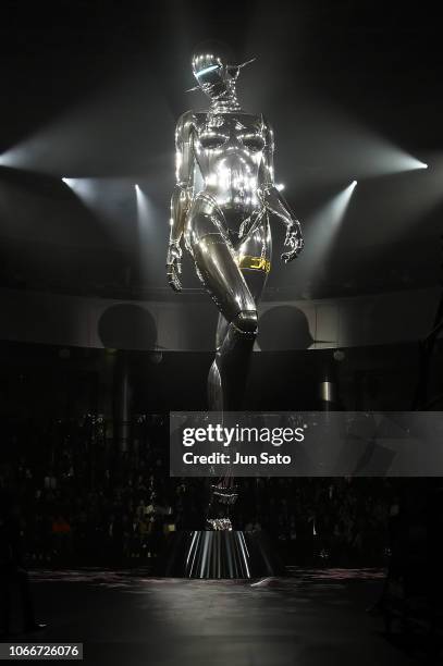General view of 11 meter high robot sculpture created by Japanese artist Hajime Sorayama during the Dior Pre-Fall 2019 Men's Collection show on...