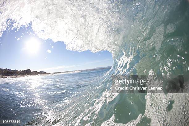 water photograph looking out the tube at supertubes jeffreys bay south africa - jeffreys bay stock pictures, royalty-free photos & images