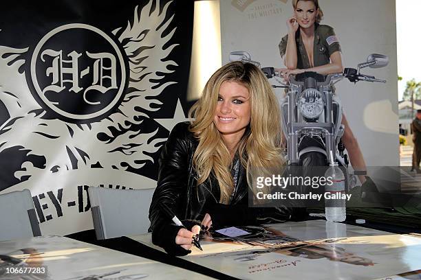 Marisa Miller, supermodel and motorcycle rider, signs autographs and thanks Marines for their service during Harley-Davidson's event at Marine Corps...