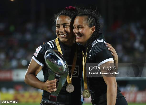 Tyla Nathan -Wong and Risaleaana- Lane of New Zealand celebrate with the trophy after winning the HSBC World Rugby Women's Sevens Series Cup Final...