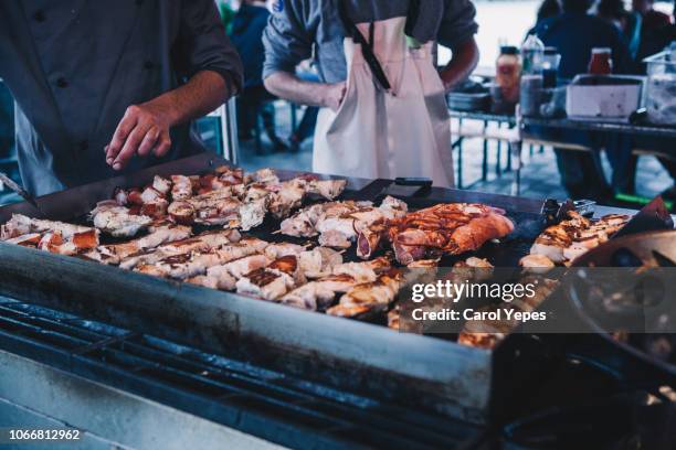 preparing fish in bergen fishmarket,norway - bergen norway stock pictures, royalty-free photos & images