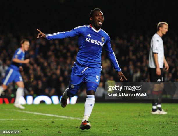 Michael Essien of Chelsea celebrates as he scores their first goal with a header during the Barclays Premier League match between Chelsea and Fulham...