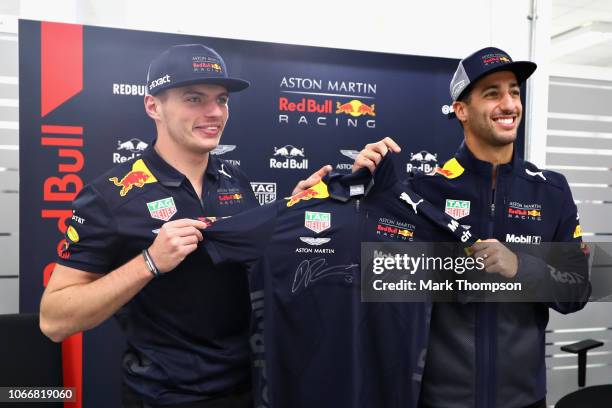 Daniel Ricciardo of Australia and Red Bull Racing and Max Verstappen of Netherlands and Red Bull Racing pose for a photo during the Red Bull Racing...