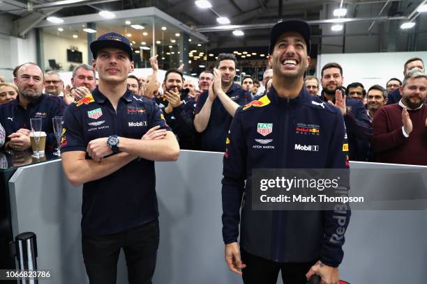 Daniel Ricciardo of Australia and Red Bull Racing and Max Verstappen of Netherlands and Red Bull Racing look on during the Red Bull Racing Drivers...