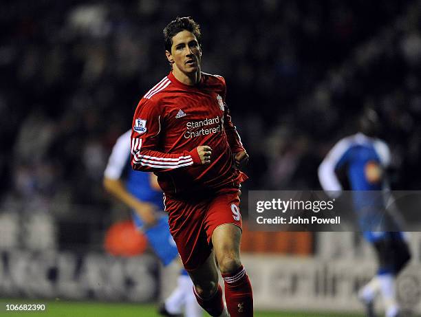 Fernando Torres of Liverpool celebrates after scoring the opening goal during the Barclays Premier League match between Wigan Athletic and Liverpool...
