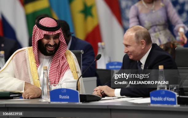 Saudi Arabia's Crown Prince Mohammed bin Salman and Russia's President Vladimir Putin attend the G20 Leaders' Summit in Buenos Aires, on November 30,...