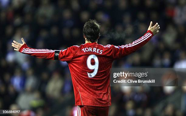 Fernando Torres of Liverpool puts his arms up in frustration during the Barclays Premier League match between Wigan Athletic and Liverpool at DW...