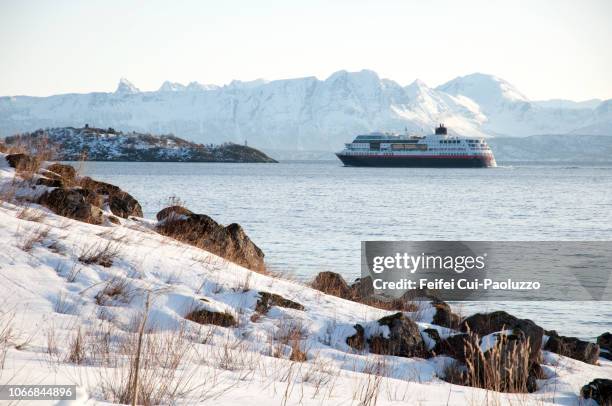 a ferry ship at bay of harstad, norway - comté de troms photos et images de collection