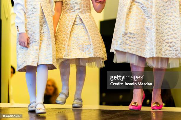 girls at fashion show - kids fashion show stock pictures, royalty-free photos & images