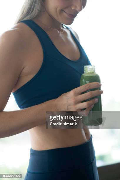 wheatgrass - green drink stock pictures, royalty-free photos & images
