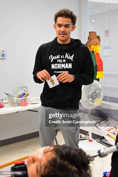 Trae Young of the Atlanta Hawks visits a childrens hospital during a visit to his hometown of Norman, Oklahoma on November 29, 2018. NOTE TO USER:...