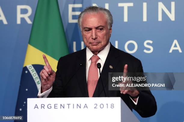 Brazil's President Michel Temer delivers a press conference on the first day of the G20 Leaders Summit in Buenos Aires on November 30, 2018. - G20...