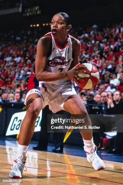 Tina Thompson of the Houston Comets handles the ball during Game Two of the 1999 WNBA Finals on September 4, 1999 at the Compaq Center in Houston,...