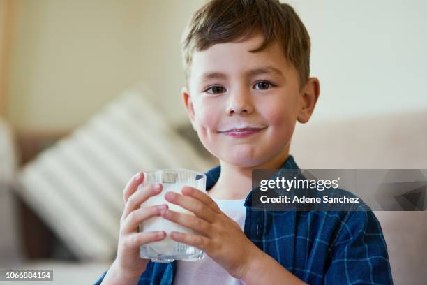 milk aka a glass of awesomeness - boy drinking milk stock pictures, royalty-free photos & images