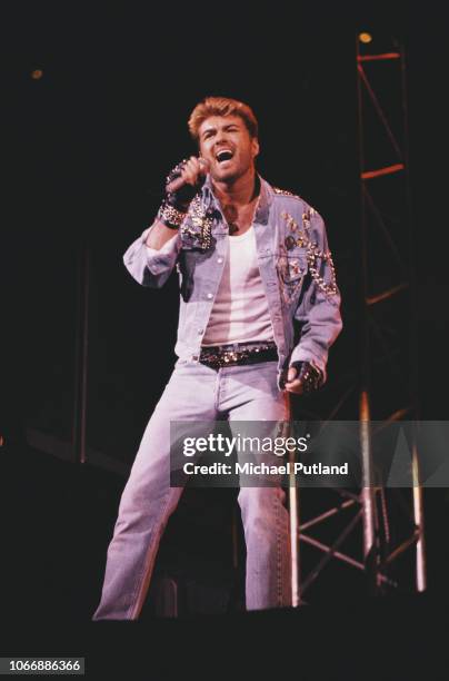 English singer and songwriter George Michael performing on stage during the Japanese/Australasian leg of his Faith World Tour, February-March 1988.