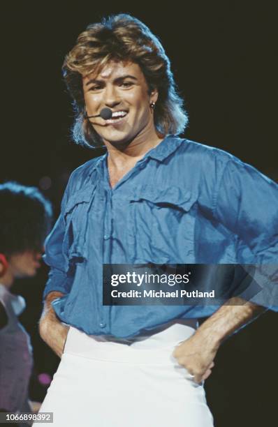 English singer and musician George Michael of Wham! performs live on stage during the Japanese leg of the pop duo's 1985 world tour in January 1985....