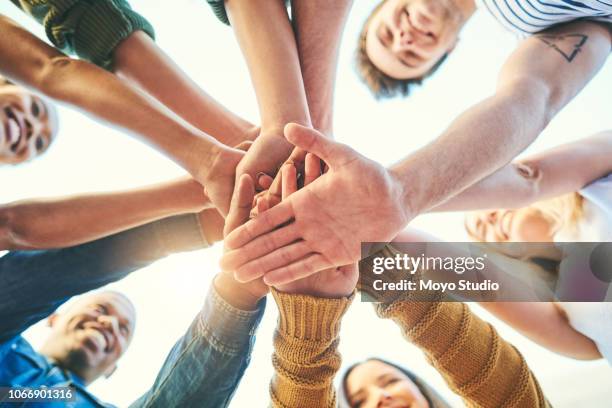 alone we do so little, but together we do so much - hands zoom in stock pictures, royalty-free photos & images