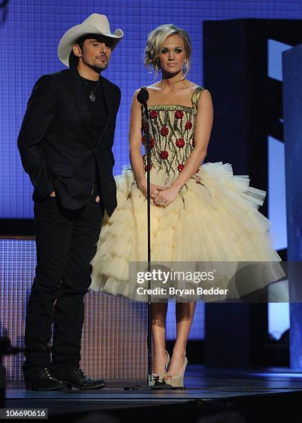 Hosts Brad Paisley and Carrie Underwood speak onstage at the 44th Annual CMA Awards at the Bridgestone Arena on November 10, 2010 in Nashville,...