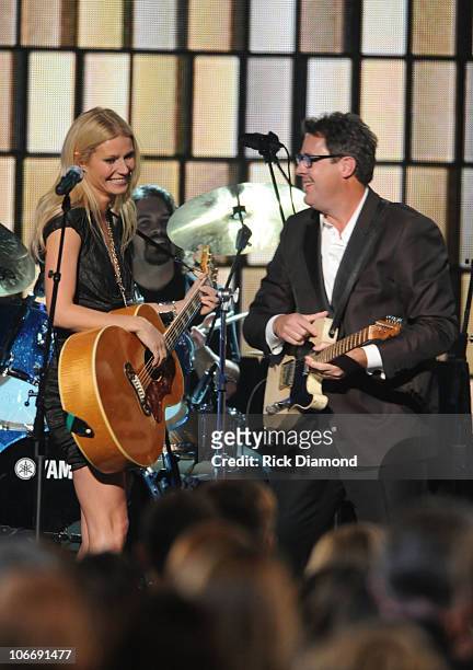 Gwyneth Paltrow and Vince Gill perform "Country Strong" at the 44th Annual CMA Awards at the Bridgestone Arena on November 10, 2010 in Nashville,...