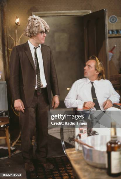 Comic actors Adrian Edmondson and Rik Mayall in a scene from episode 'Accident' of the BBC television sitcom 'Bottom', July 12th 1991.